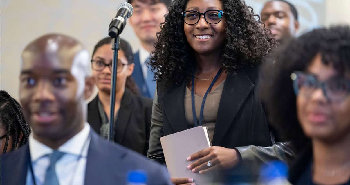 Toigo Foundation event with diverse attendees, emphasizing leadership, innovation, and diversity in business education. Focus on empowering future leaders through networking and mentorship.